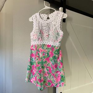 Cute lilly Pulitzer romper size 2 with white detail. so flattering on!